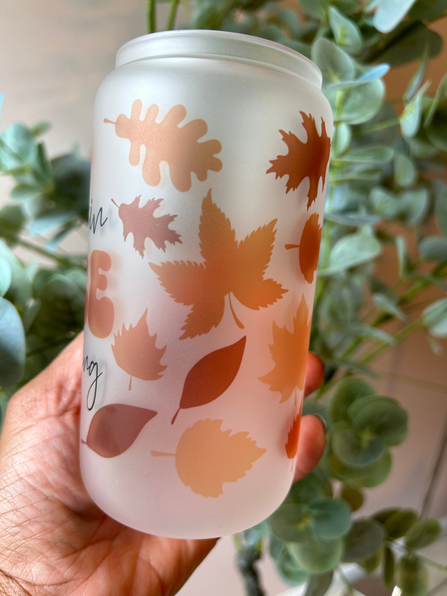 Pumpkin Spice Everything Frost Glass Can, Left side with yellow orange brown leaves