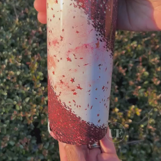 A video of a 20oz fatty stainless steel tumbler with red stars, sparkles, and cheetah prints.  This tumbler includes a silicone bottom, leakproof top, metal straw and straw cleaner. A full view with a customizable option.