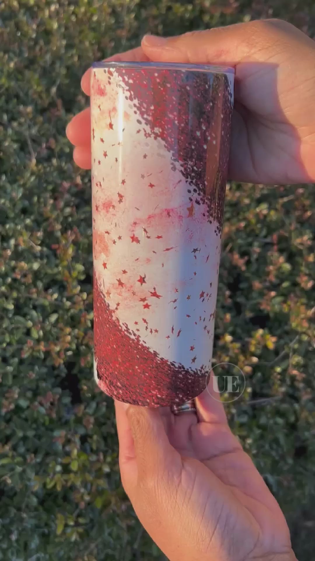 A video of a 20oz fatty stainless steel tumbler with red stars, sparkles, and cheetah prints.  This tumbler includes a silicone bottom, leakproof top, metal straw and straw cleaner. A full view with a customizable option.
